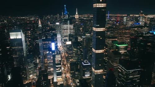 Aerial Birds Eye Perspective of New York City Skyscrapers at Night Manhattan