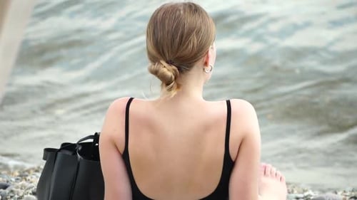 Woman Reading Book and Sitting on the Beach on Vacation Summer Holidays Travel Concept Summer Chill