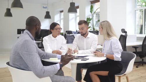 Multiethnic Business People During Meeting in Modern Office