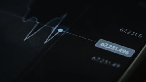 Macro View of Bitcoin Price Line Chart on Smartphone Showing Realtime Data