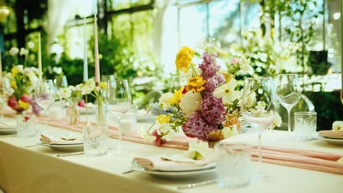 Elegant Wedding Table Setting with Floral Centerpiece