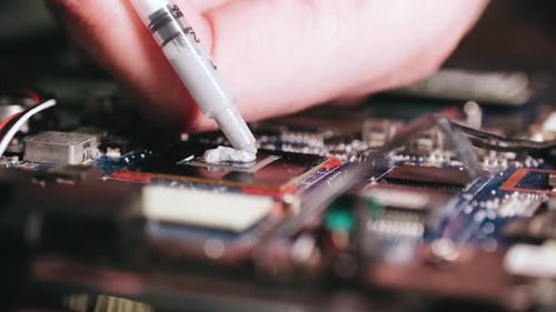 Laptop Cooling System Repair Disconnecting the Cable and Removing the Cooling Cooler Closeup