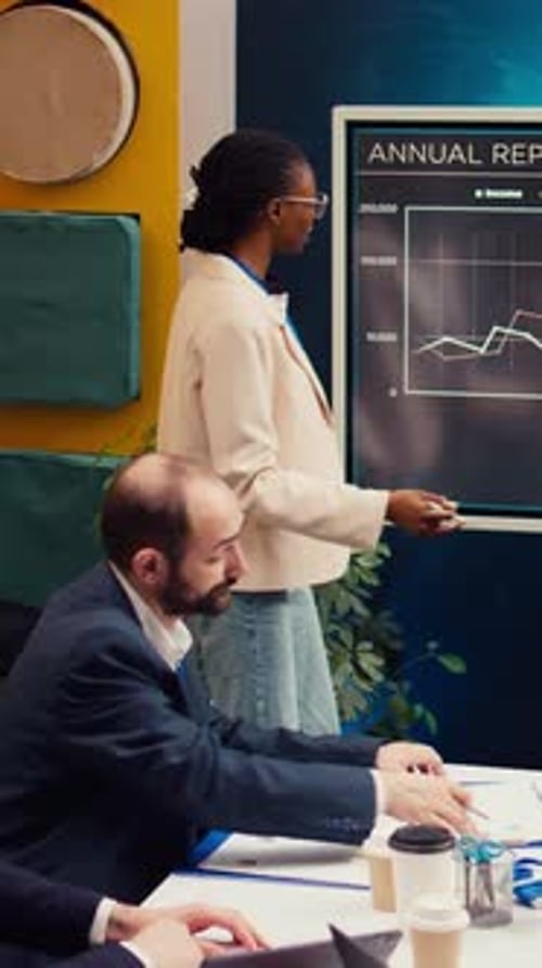 Woman Presents Annual Report at Corporate Meeting