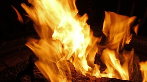 Close Up of Fiery Flames in a Pit