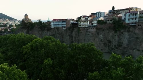 Metekhi Church And Buildings On The Cliff Along The Mtkvari In Tbilisi, Georgia. - aerial
