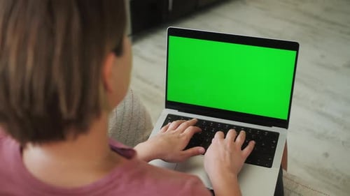 Close Up Shot of Woman at Home Using Laptop