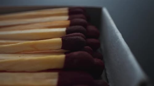 Detailed Shot of Wooden Matches Arranged in a Box