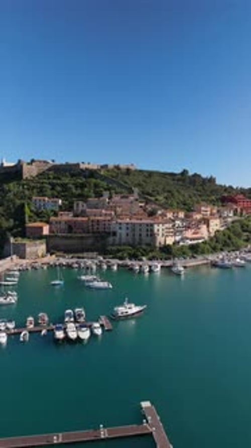 Serene Porto Ercole Marina with Fortified Hilltop