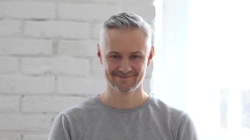 Man Smiling Portrait with Gray Hair and Beard