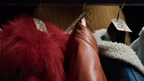 Jackets for Sale Hanging on Rack in Store