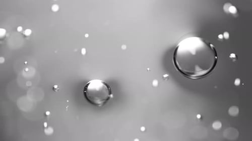 Abstract science or art background with silver bubbles rising