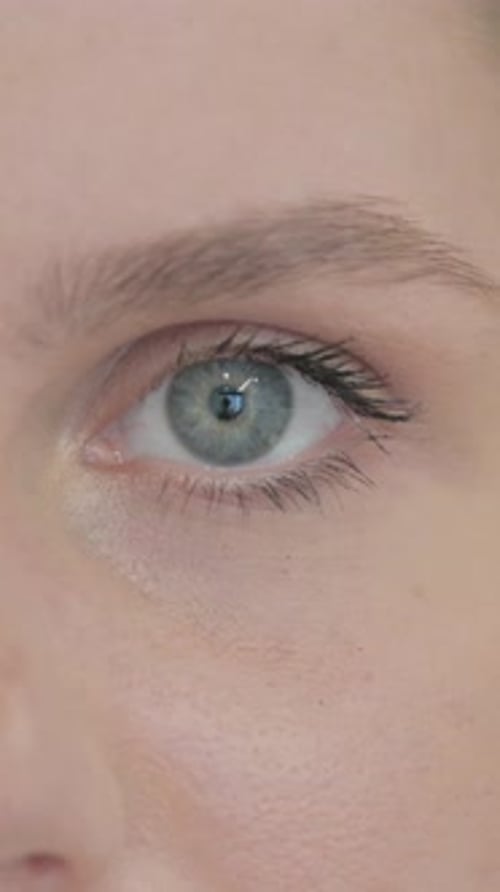 Close up of Beautiful Female Blinking Eyes, Vertical Video