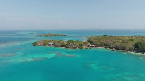 Drone view of Isla Grande in Rosario Islands, Colombia, surrounded by crystal clear Caribbean
