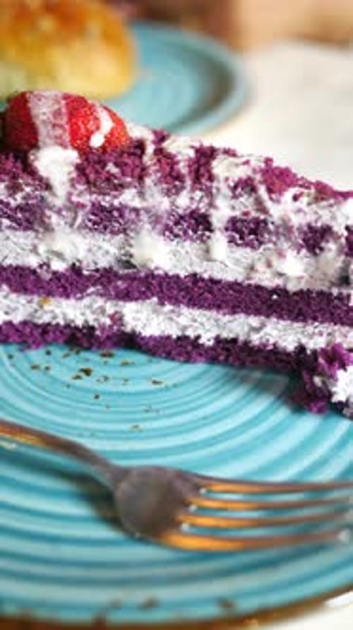 Slice of Purple Cake on a Plate