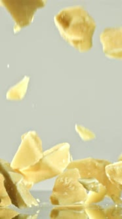 Super Slow Motion Pieces of White Chocolate Filmed on a Highspeed Camera at 1000 Fps