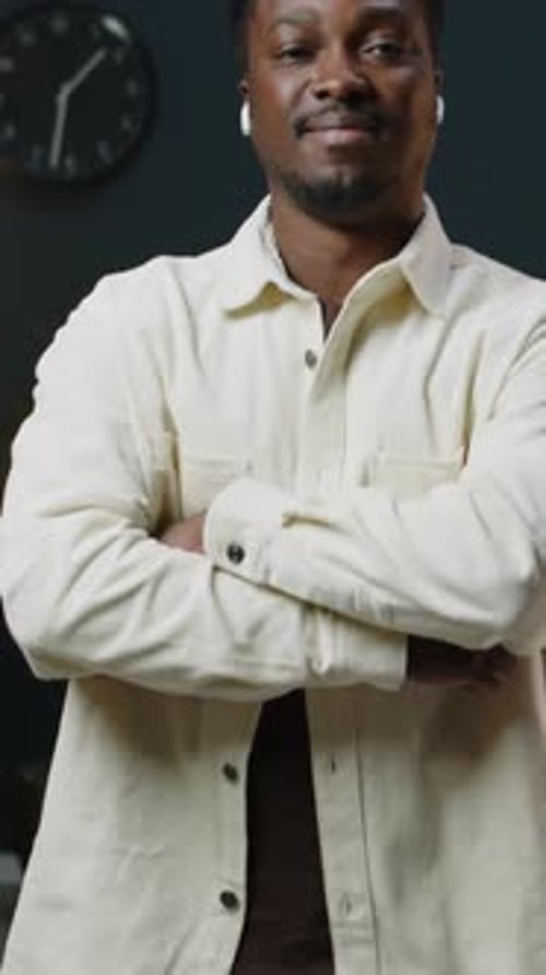 Stylish Man Posing Confidently Indoors