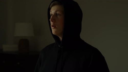 Young Man in Hood Looking to the Side