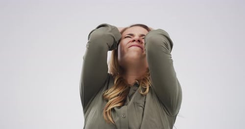 Distressed Woman Expressing Anxiety and Frustration