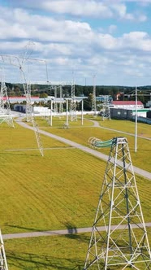 Electrical power distribution system. Aerial view of electric high voltage construction.