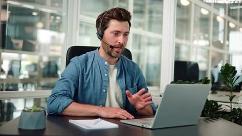 Telemarketer Operator Representative Speaking to Web Camera in Office