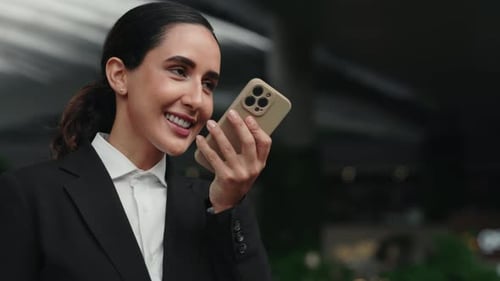 Business Girl in Office Using Microphone Smartphone Voice Recognition Recording Message