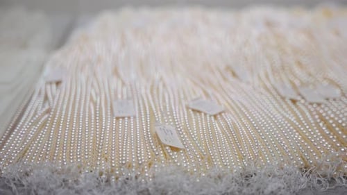 Precious Pearl Necklaces laid out on display, Mikimoto Peal Island 4k