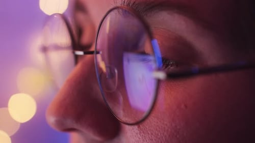 Woman Works at Computer Screen Late at Night