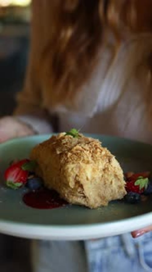 Creamy Pastry Dessert with Berries close up