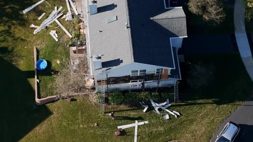 Drone View of Residential Townhouse Under Renovation Construction Materials and Equipment are