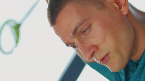 Sweaty Man Exercising in Gym Close Up