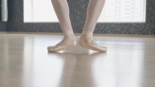 Ballet Dancer Practicing Footwork in Dance Studio