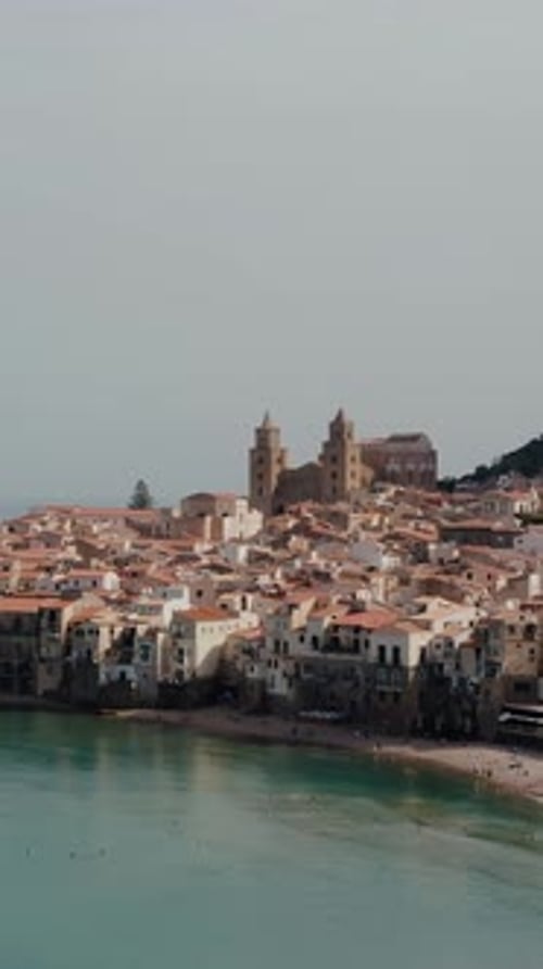 Vertical aerial view of Cefalu, an ancient Italian town along the Mediterranean sea coast of Sicily