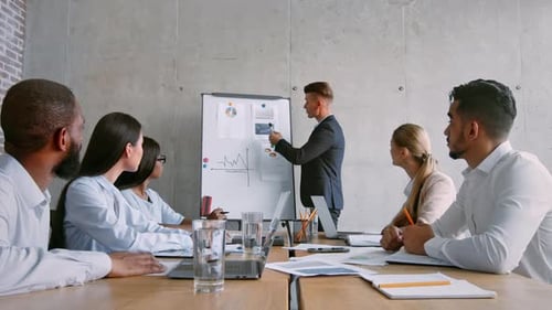 Creative Team Collaborates in Modern Office for Successful Project Presentation