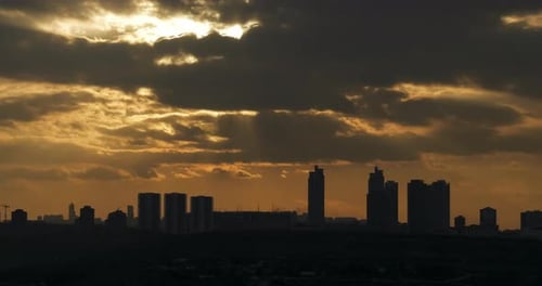 Time Lapse Footage Of Sunset, Skyscrapers And Cloudy Sky