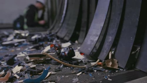 Conveyor Line at the Waste Recycling Plant Garbage Factory Plastic Polymer Waste is Transported