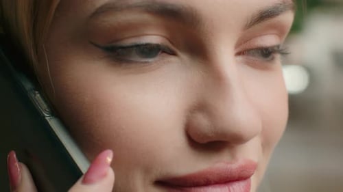 Close Up of Woman Talking on Cellphone