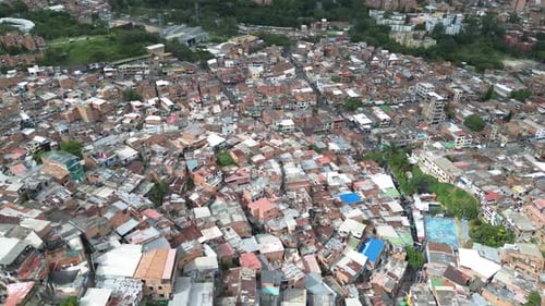 Comuna 13, Medellin Panoramic Dolly: Packed Rooftops on Hillside
