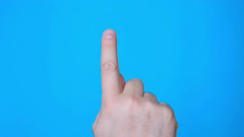 Closeup View of Male Hand Touching Clicking with Finger on Blue Chromakey Screen
