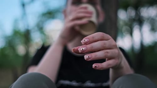 Woman Holding Coffee Cup Close Up