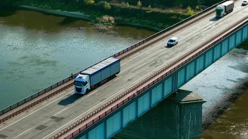 White Freight Truck Driving Across River Bridge Cargo Lorry Transporting Goods Over Elevated Highway