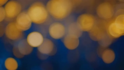 Abstract Golden and Blue Bokeh Lights Background Loop