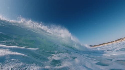 Ocean wave breaks on the shore in Brazil. Wave rolls and breaks over the coastal area. Underwater