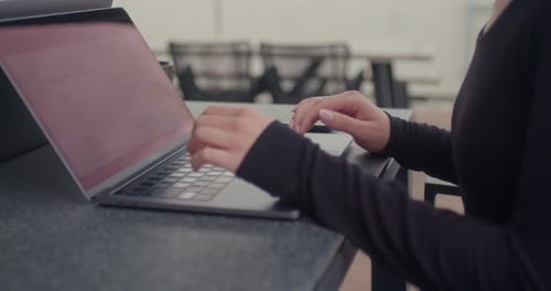 Woman working with laptop in the office