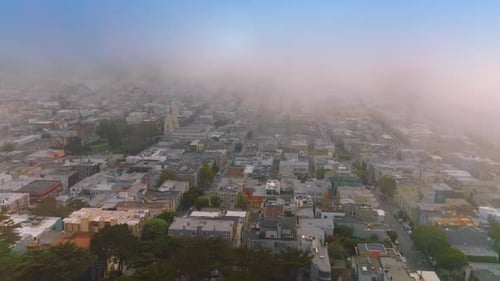 Flying over the residential area of beautiful San Francisco at sundown.