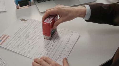 Visa Application Rejection with Stamp on Document