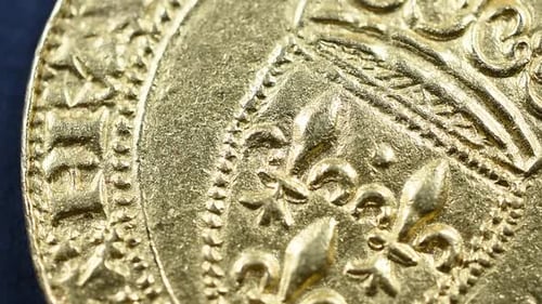 Old Gold Coin Close Up Rotating