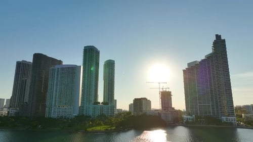 Tower Lifting Cranes at High Residential Apartment Building Construction Site Real Estate