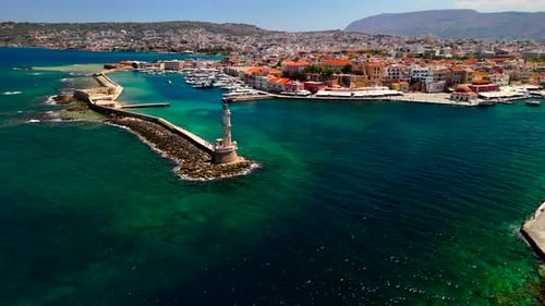 Beautiful aerial view of Chania harbor in Crete with lighthouse and colorful buildings