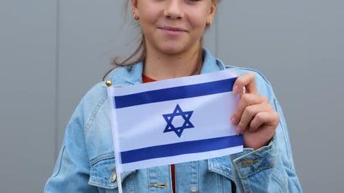Teen Waving Flag of Israel, Close Up