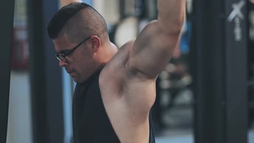 Man Strength Training at Gym Workout